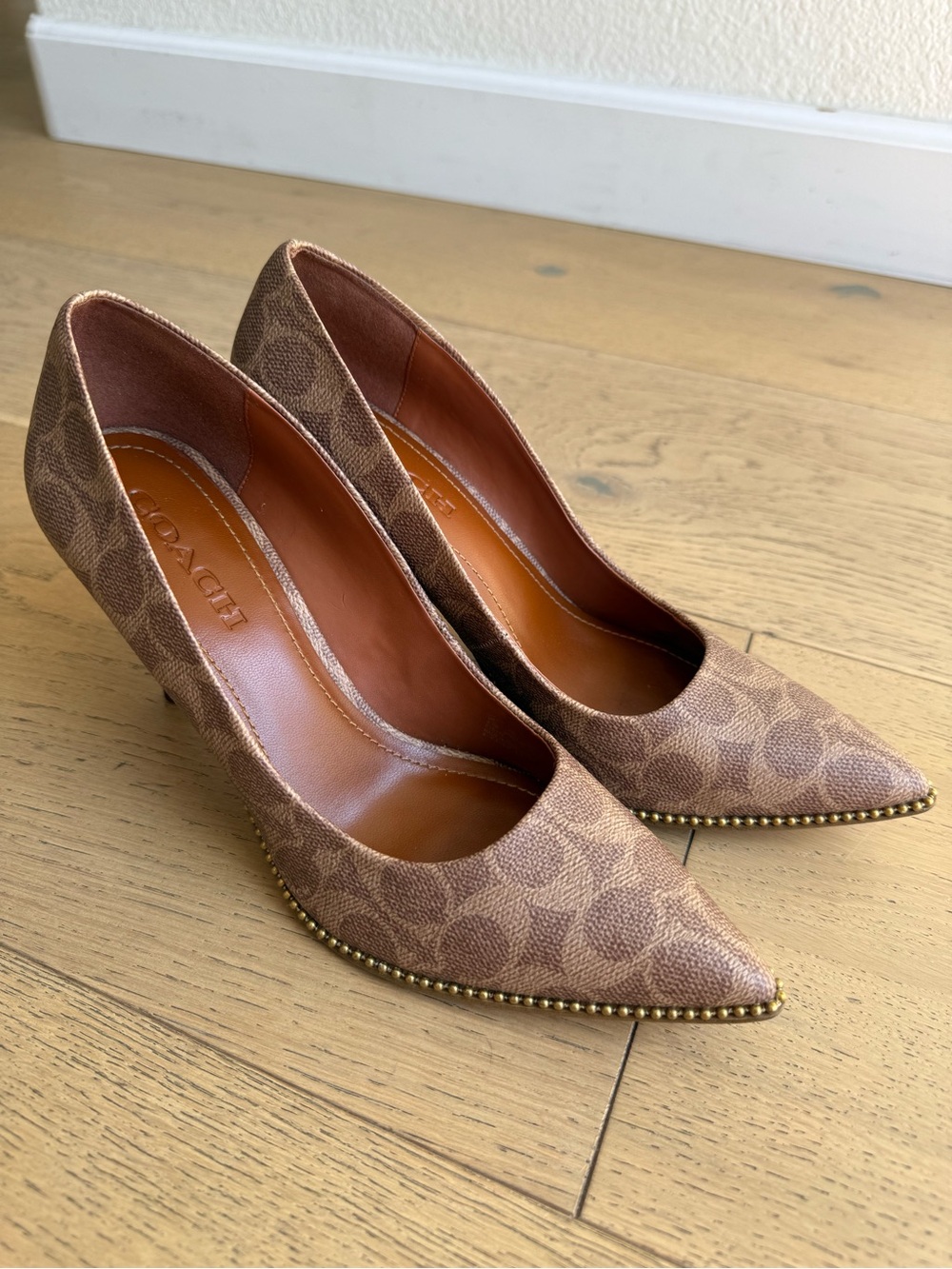 Coach Waverly Signature Pointed-Toe Heels with Gold Stud Trim in Taupe/Brown